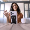 image:imageSpeck iPhone Grip Viewing Stand MagSafe Accessory  ClickLock NoSlip Interlock  360 Adjustable Finger Grip Mounts to MacBook Continuity Camera for iPhone  StandyGrip  Black
